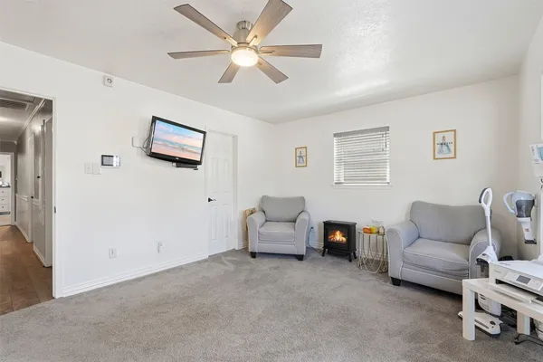 a living room with furniture and a couch
