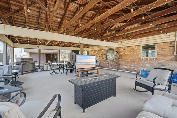 a outdoor space with patio lots of furniture