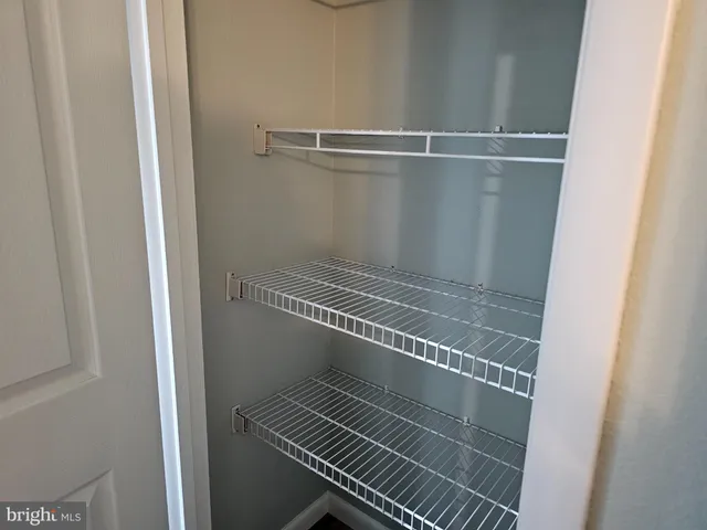 a bathroom with a glass door shower