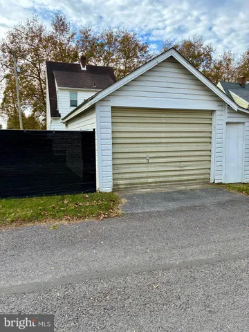 a view of a backyard of the house