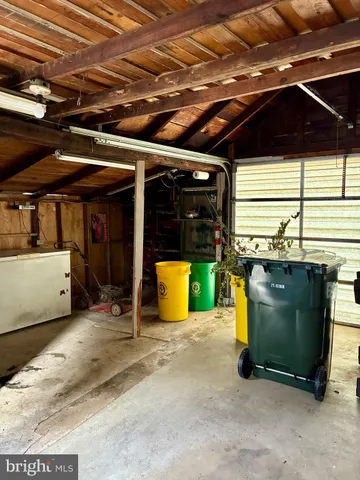 a view of a garage with wooden wall