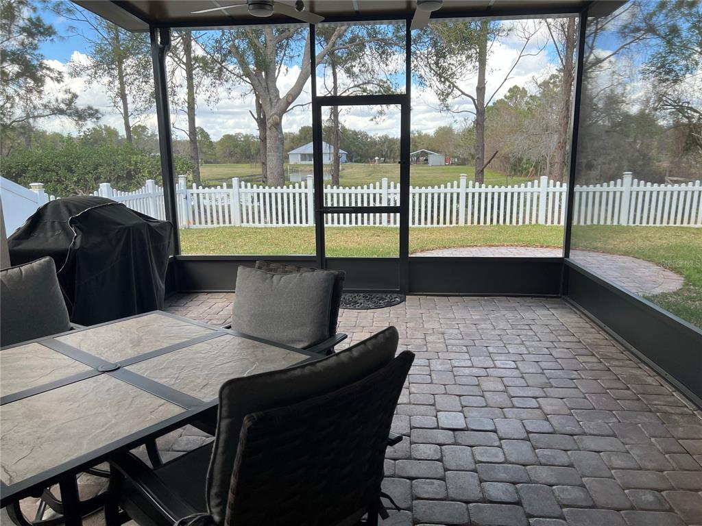 4419 Azure Isle Way Kissimmee, FL 34744 - Photo 27 of 39 a living room with a large window