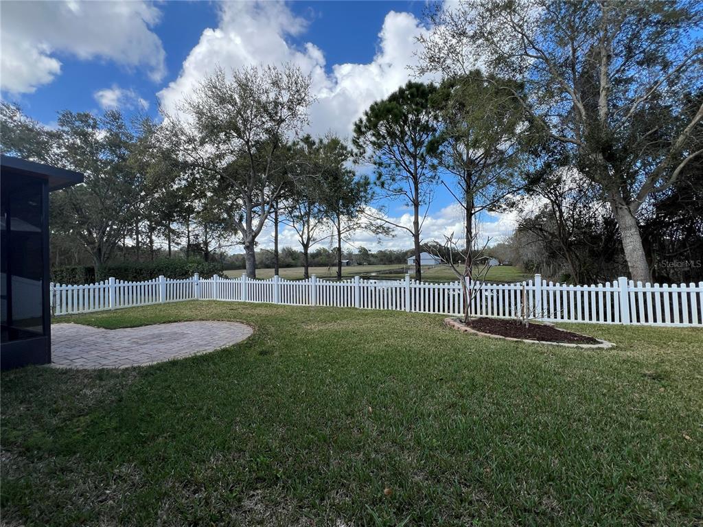 4419 Azure Isle Way Kissimmee, FL 34744 - Photo 33 of 39 a view of a park with a large tree