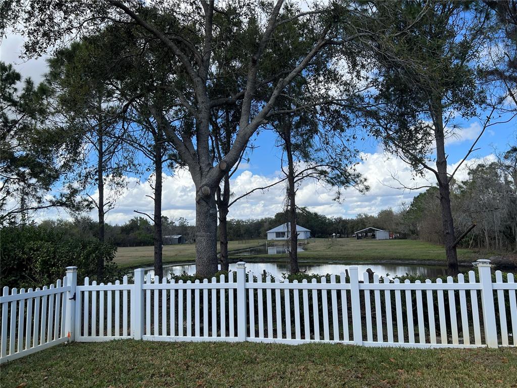 4419 Azure Isle Way Kissimmee, FL 34744 - Photo 35 of 39 a view of a wooden fence