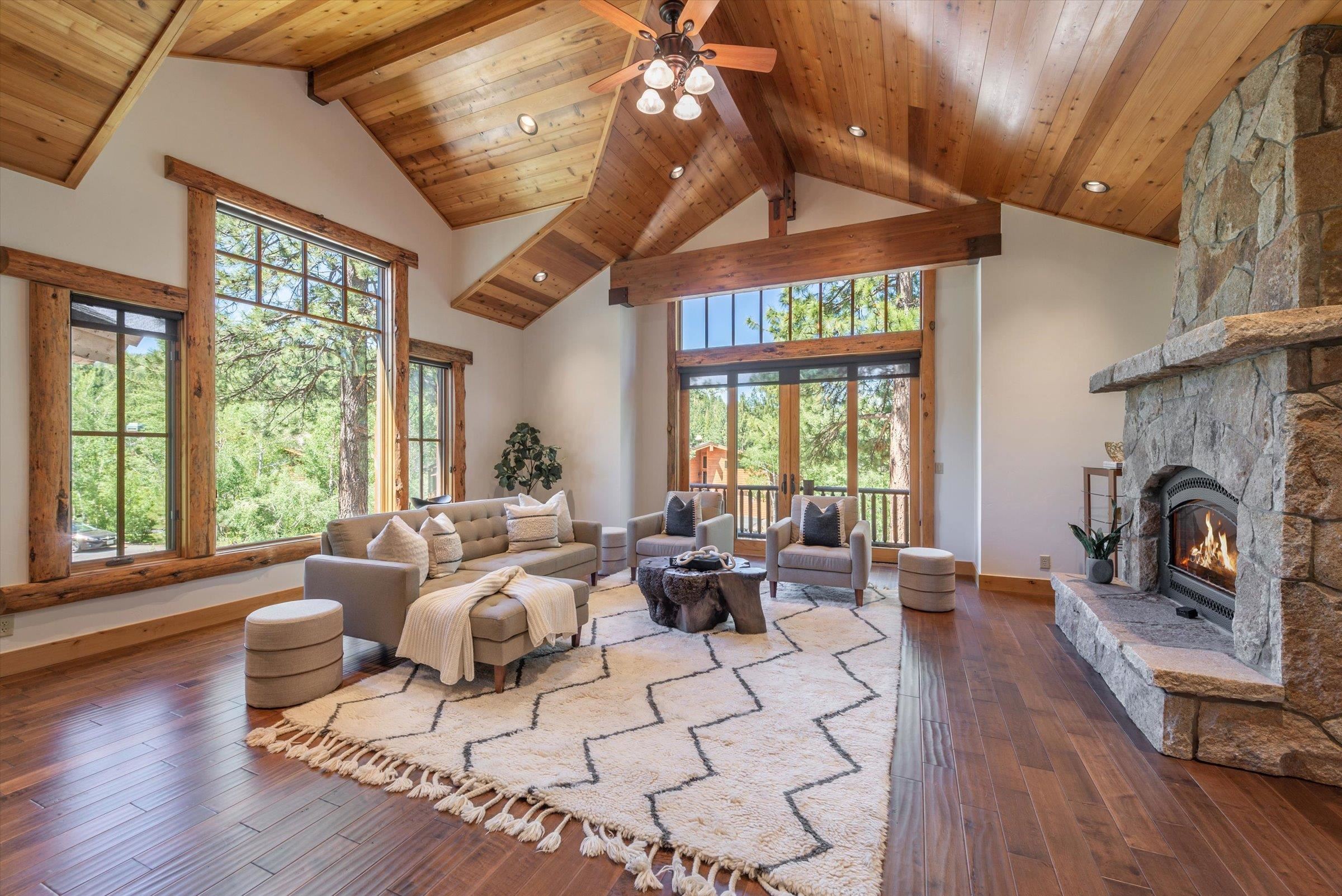 350 Skidder Trail Truckee, CA 96161 - Photo 2 of 20 a living room with furniture large window and wooden floor