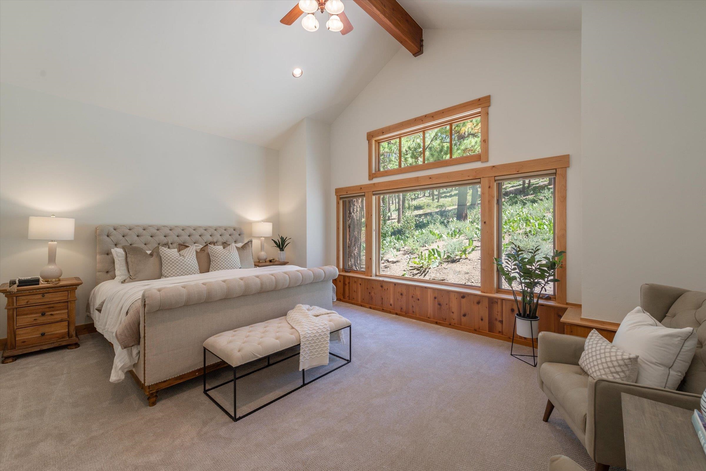 350 Skidder Trail Truckee, CA 96161 - Photo 6 of 20 a spacious bedroom with a bed and a large window