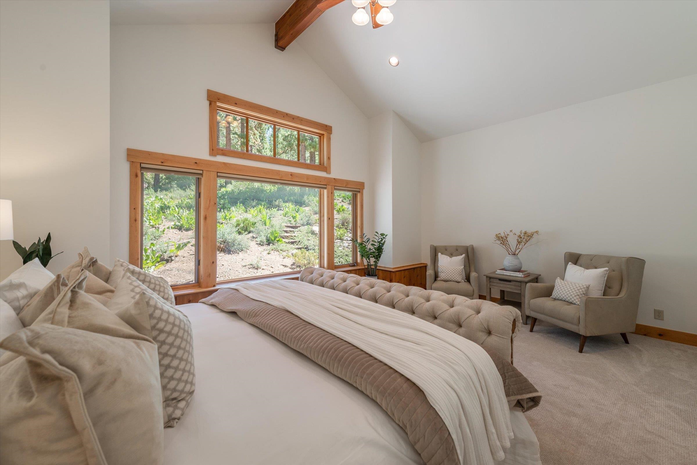 350 Skidder Trail Truckee, CA 96161 - Photo 7 of 20 a bed sitting in a bedroom next to a window