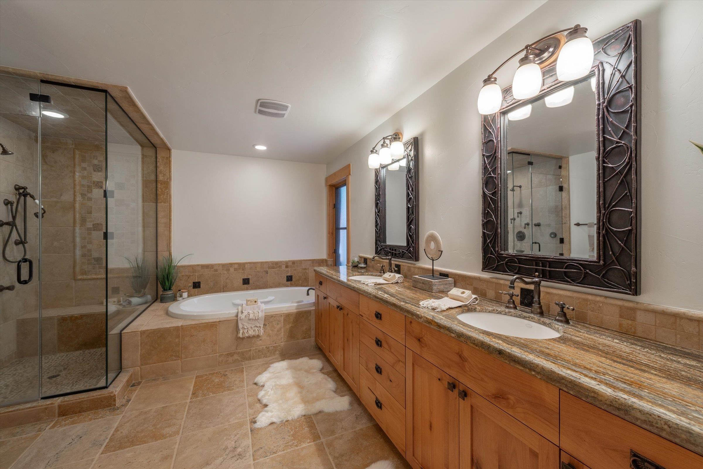 350 Skidder Trail Truckee, CA 96161 - Photo 9 of 20 a bathroom with a bathtub shower sink double and mirror