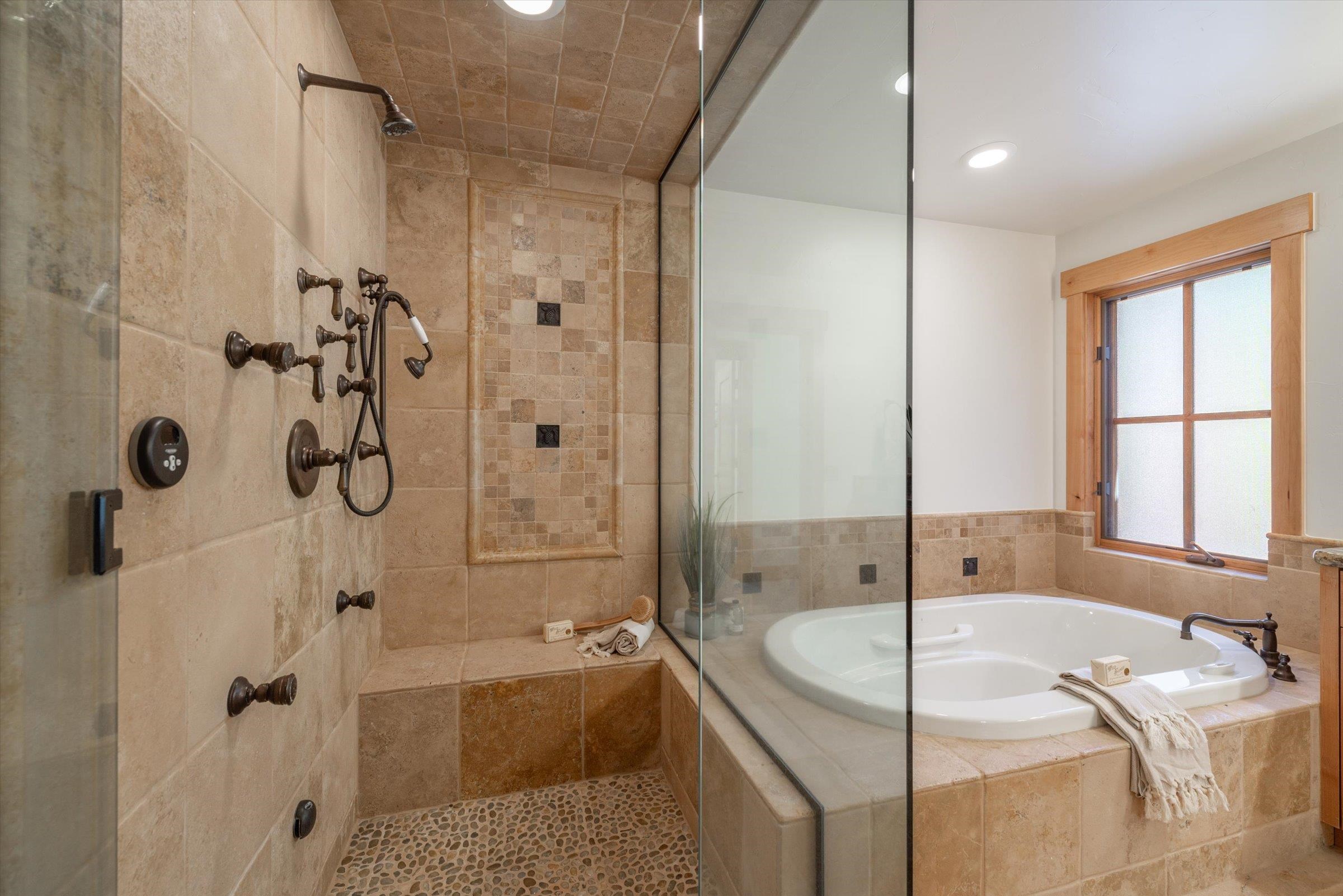 350 Skidder Trail Truckee, CA 96161 - Photo 10 of 20 a bathroom with a tub sink and mirror