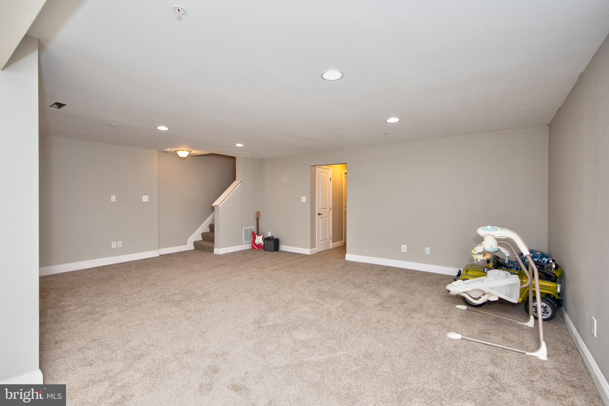 513 Callander Way Abingdon, MD 21009 - Photo 24 of 28 Family room with new carpet and recessed lighting
