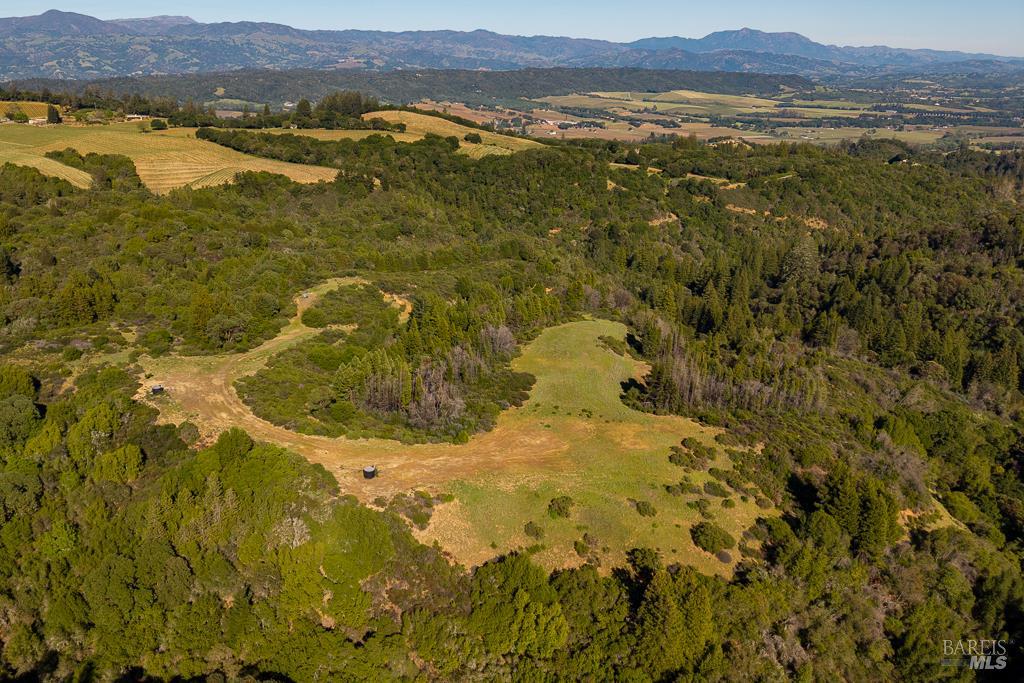 0 West Dry Creek Road Healdsburg, CA 95448 - Photo 17 of 19 a view of a lake with mountains in the background