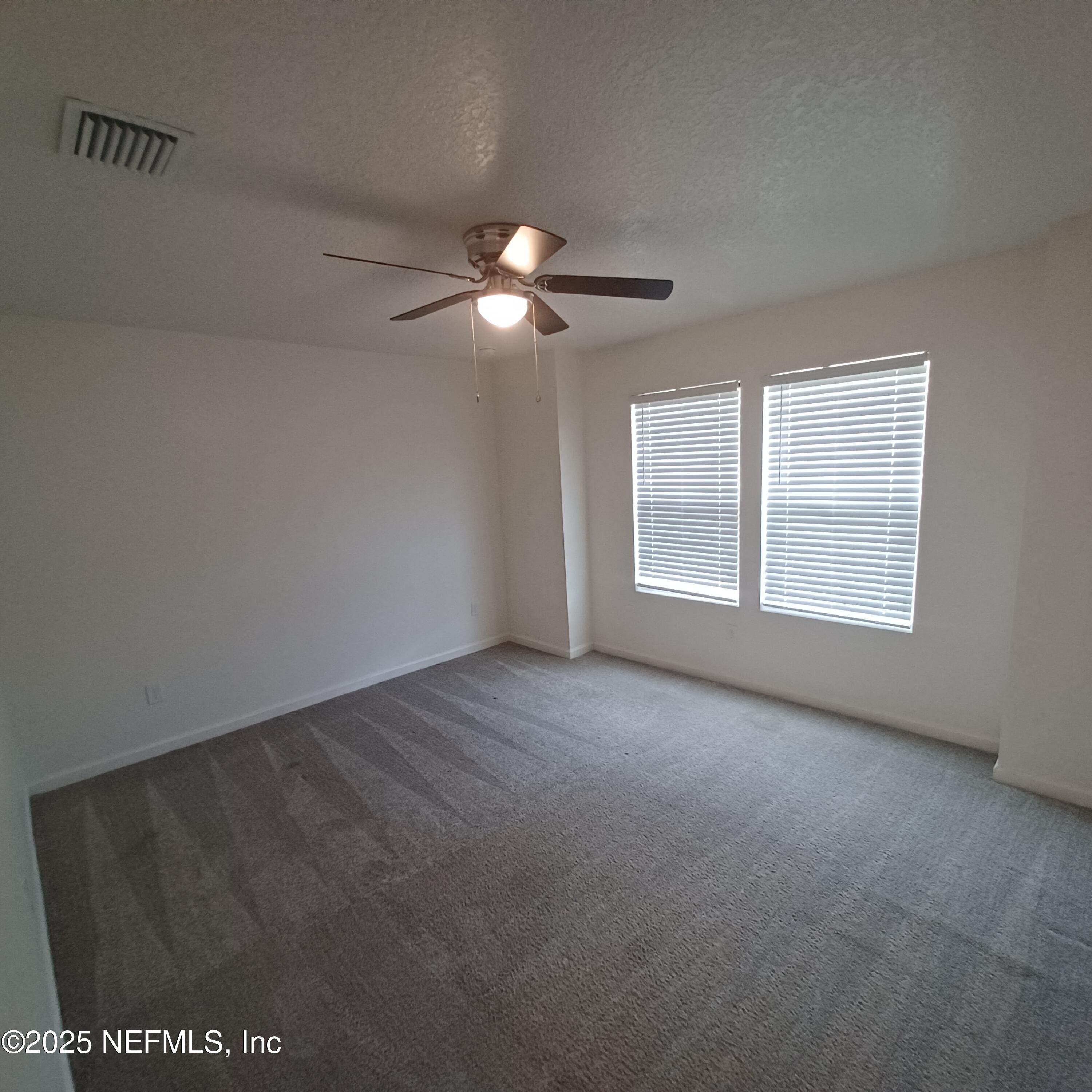 695 Duval Street St. Augustine, FL 32084 - Photo 9 of 20 a view of an empty room with a window