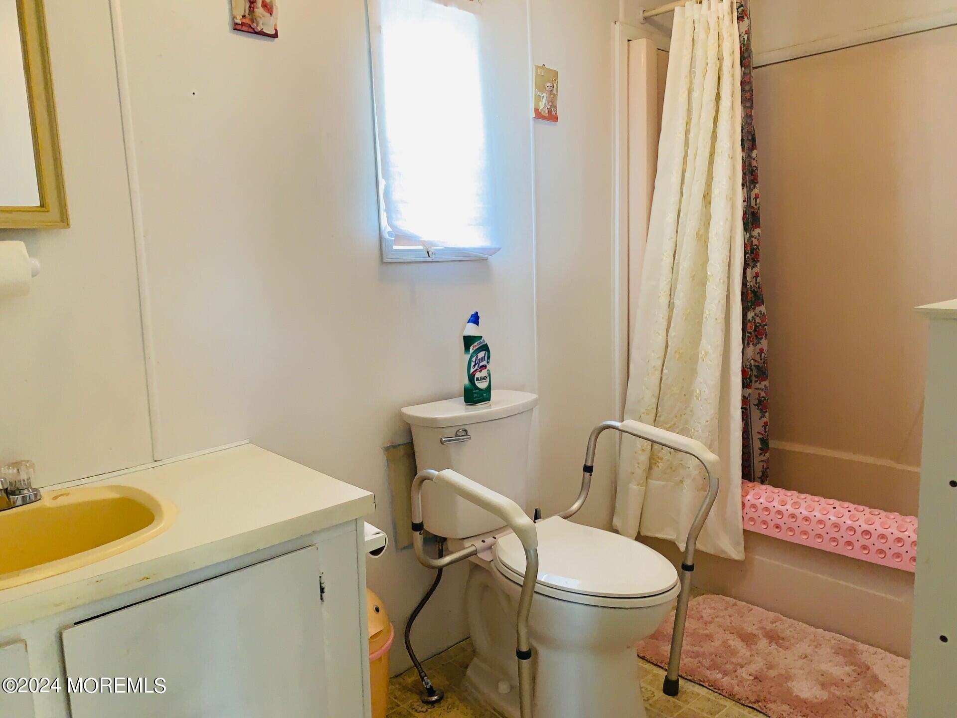 31 Panda Lane Whiting, NJ 08759 - Photo 16 of 16 a white toilet sitting next to a bathroom sink