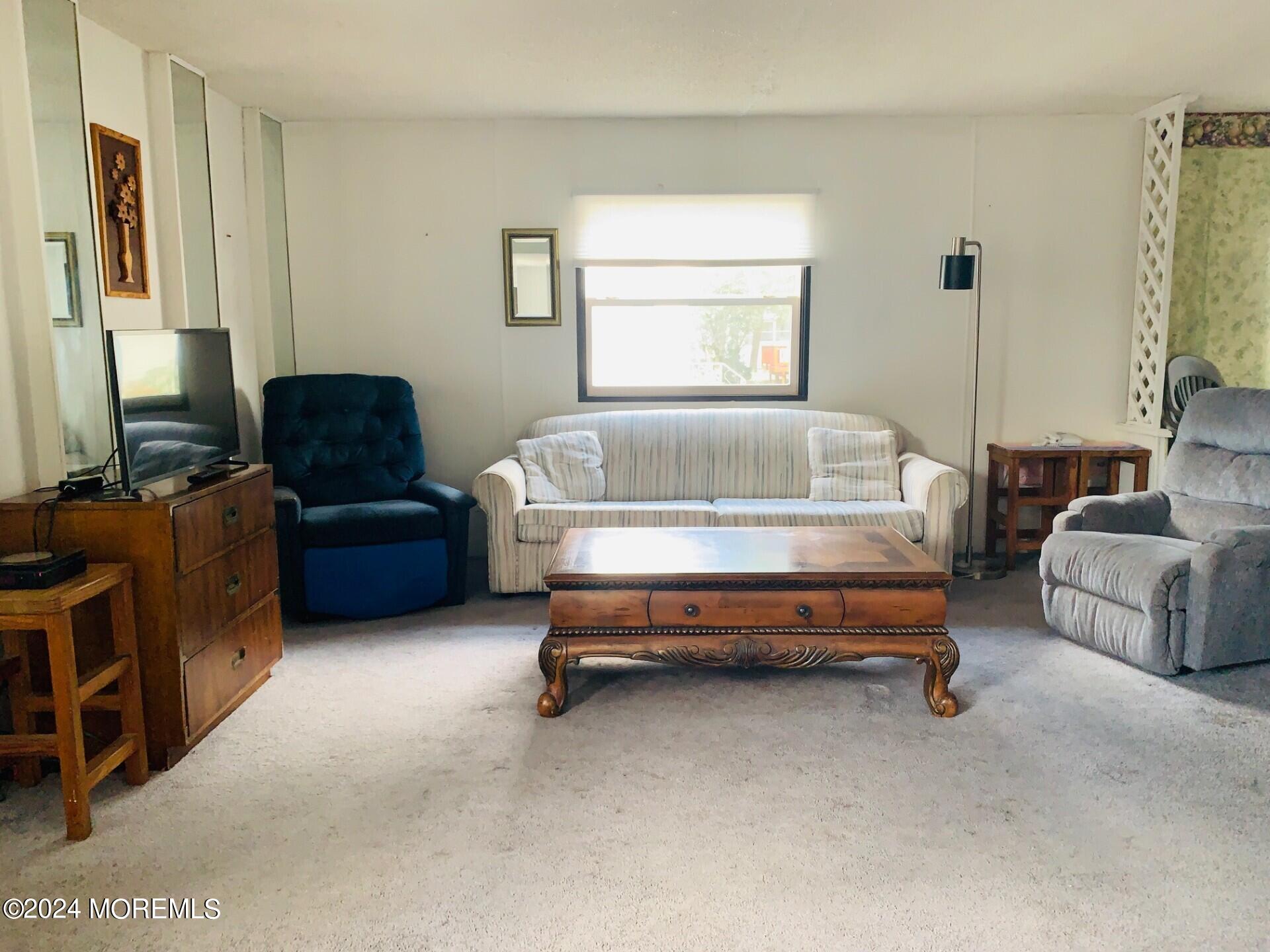 31 Panda Lane Whiting, NJ 08759 - Photo 6 of 16 a bedroom with furniture and a couch