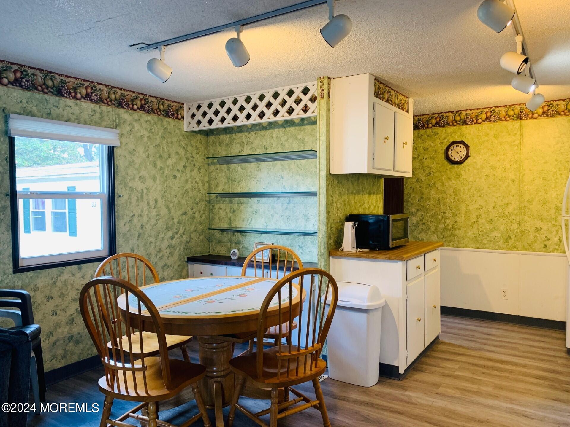 31 Panda Lane Whiting, NJ 08759 - Photo 8 of 16 a kitchen that has a table and chairs in it