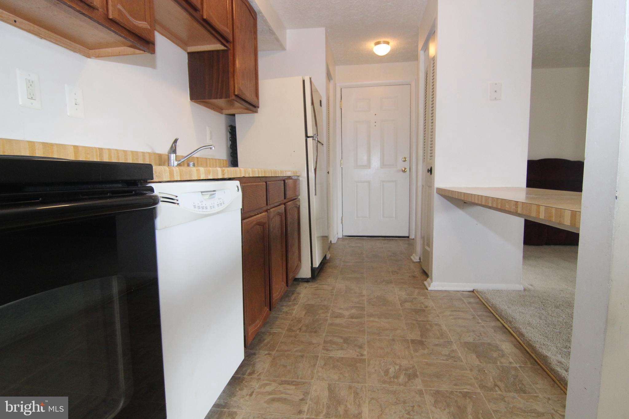 650 Heather Ridge Drive, Unit 12C Frederick, MD 21702 - Photo 13 of 37 Bright Sunlit kitchen with lots of counter space.