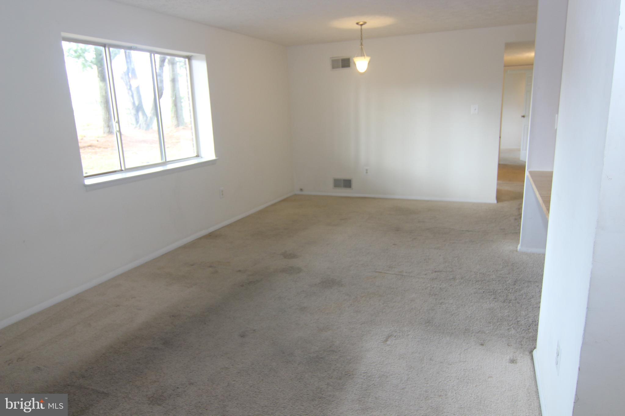 650 Heather Ridge Drive, Unit 12C Frederick, MD 21702 - Photo 20 of 37 Living Room & Dining Area
