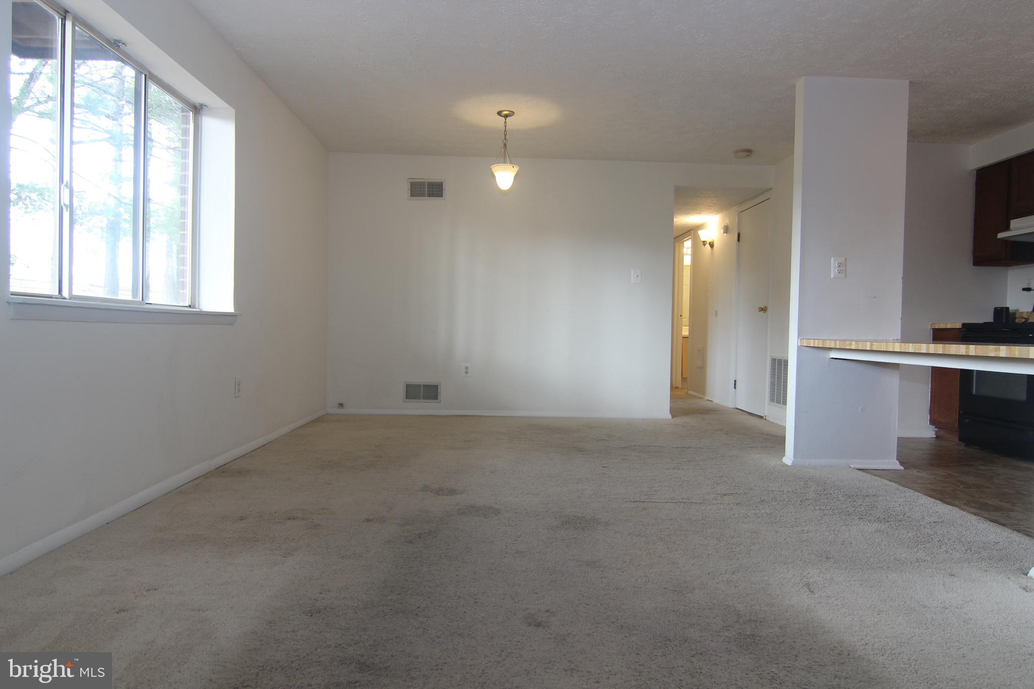 650 Heather Ridge Drive, Unit 12C Frederick, MD 21702 - Photo 21 of 37 Living Room & Dining Area