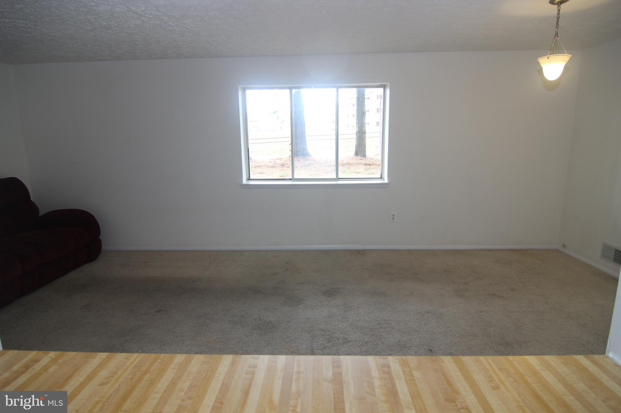 650 Heather Ridge Drive, Unit 12C Frederick, MD 21702 - Photo 22 of 37 Living Room & Dining Area