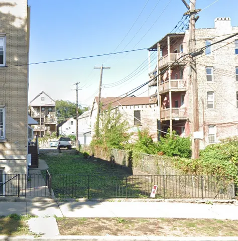 a view of a house with a swimming pool