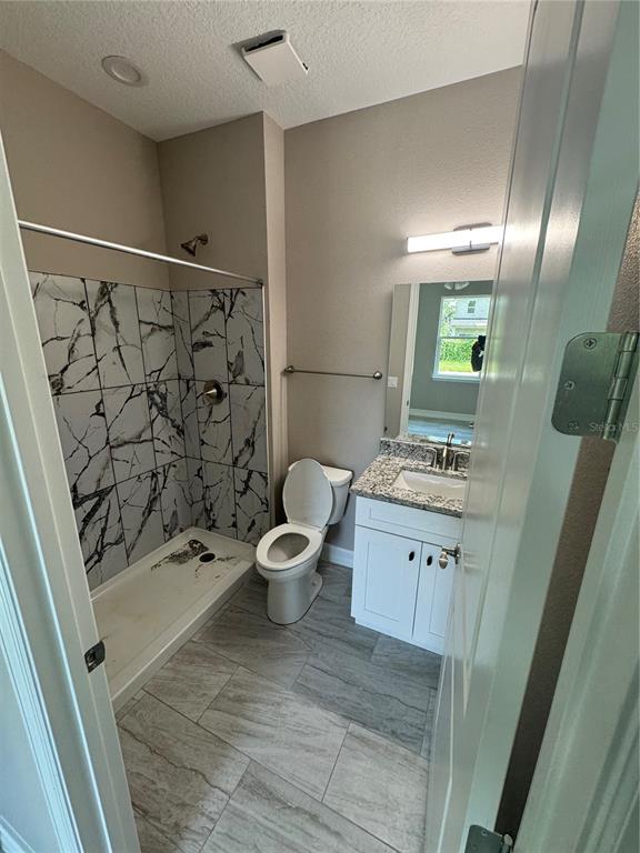 5238 2nd Street Orlando, FL 32810 - Photo 11 of 19 a bathroom with a sink toilet and shower