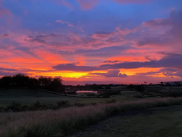 a view of lake with mountain in background