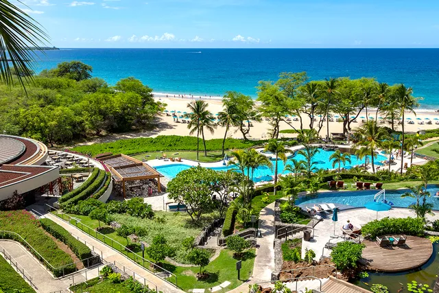 a gym room with lots of gym equipment