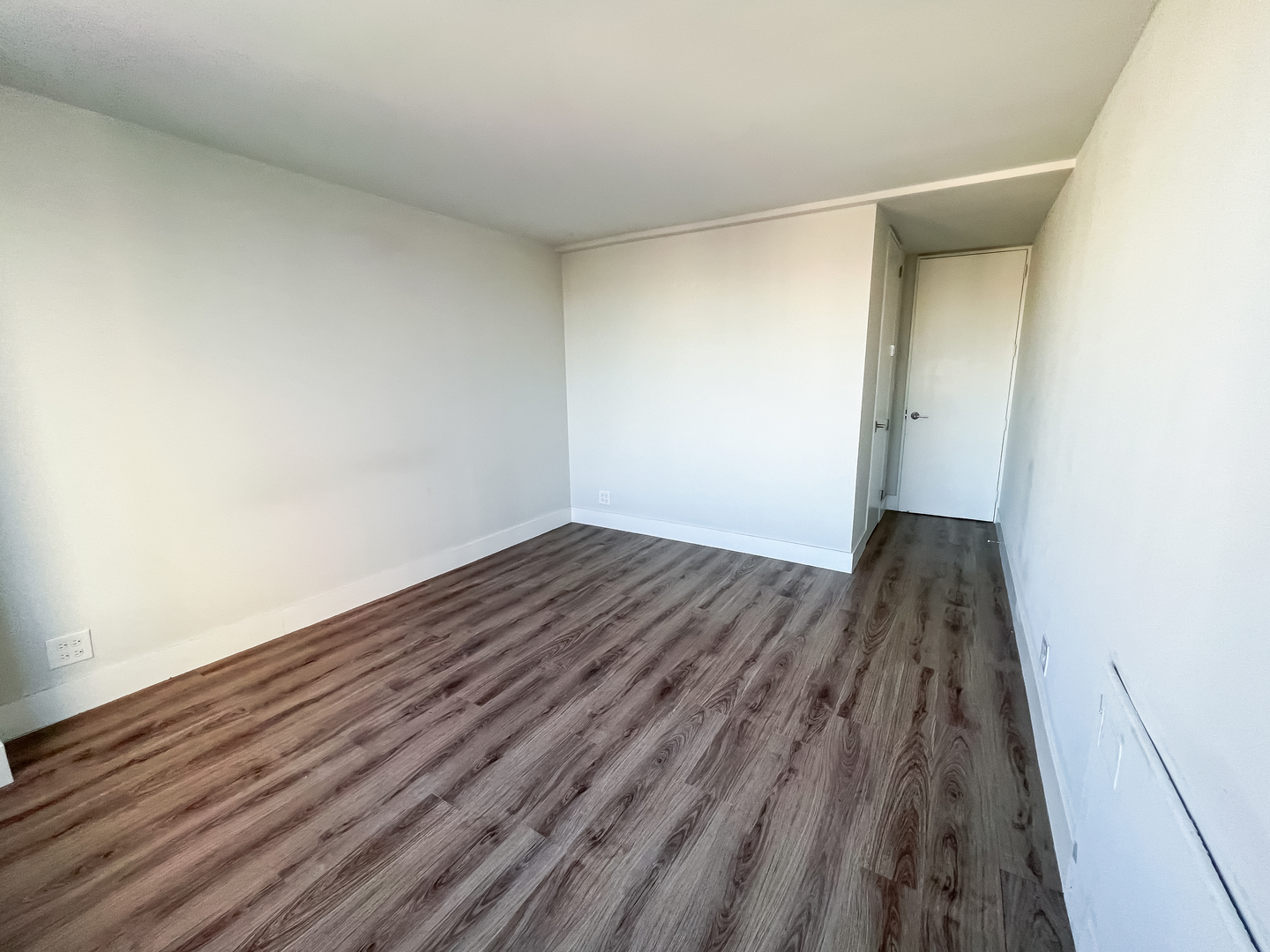 Undisclosed Address Chicago, IL 60611 - Photo 7 of 11 a view of wooden floor in an empty room