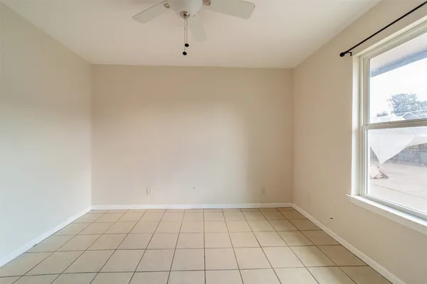 a house view with a backyard space