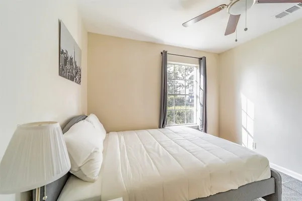 a view of an empty room and window