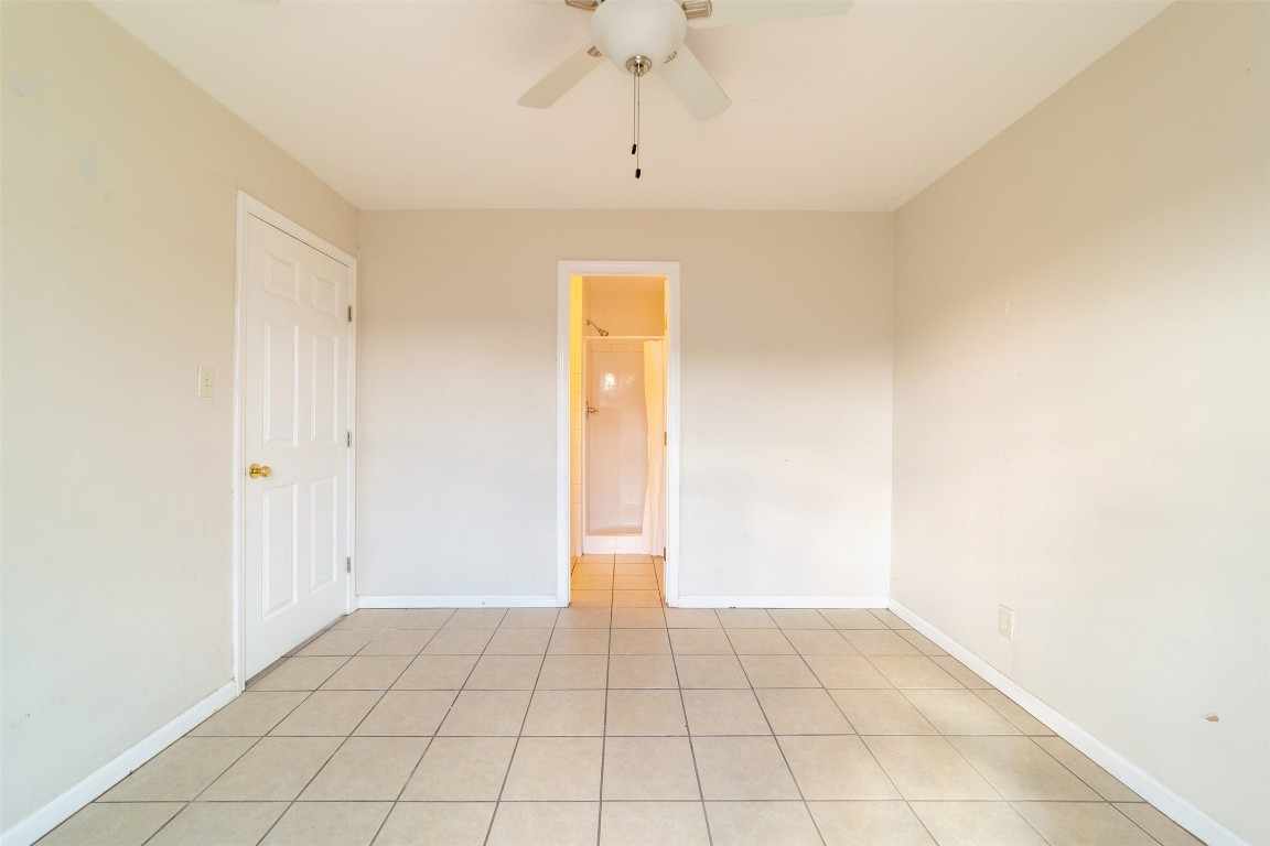 1738 Rutland Drive, Unit A Austin, TX 78758 - Photo 10 of 30 a view of an empty room and window