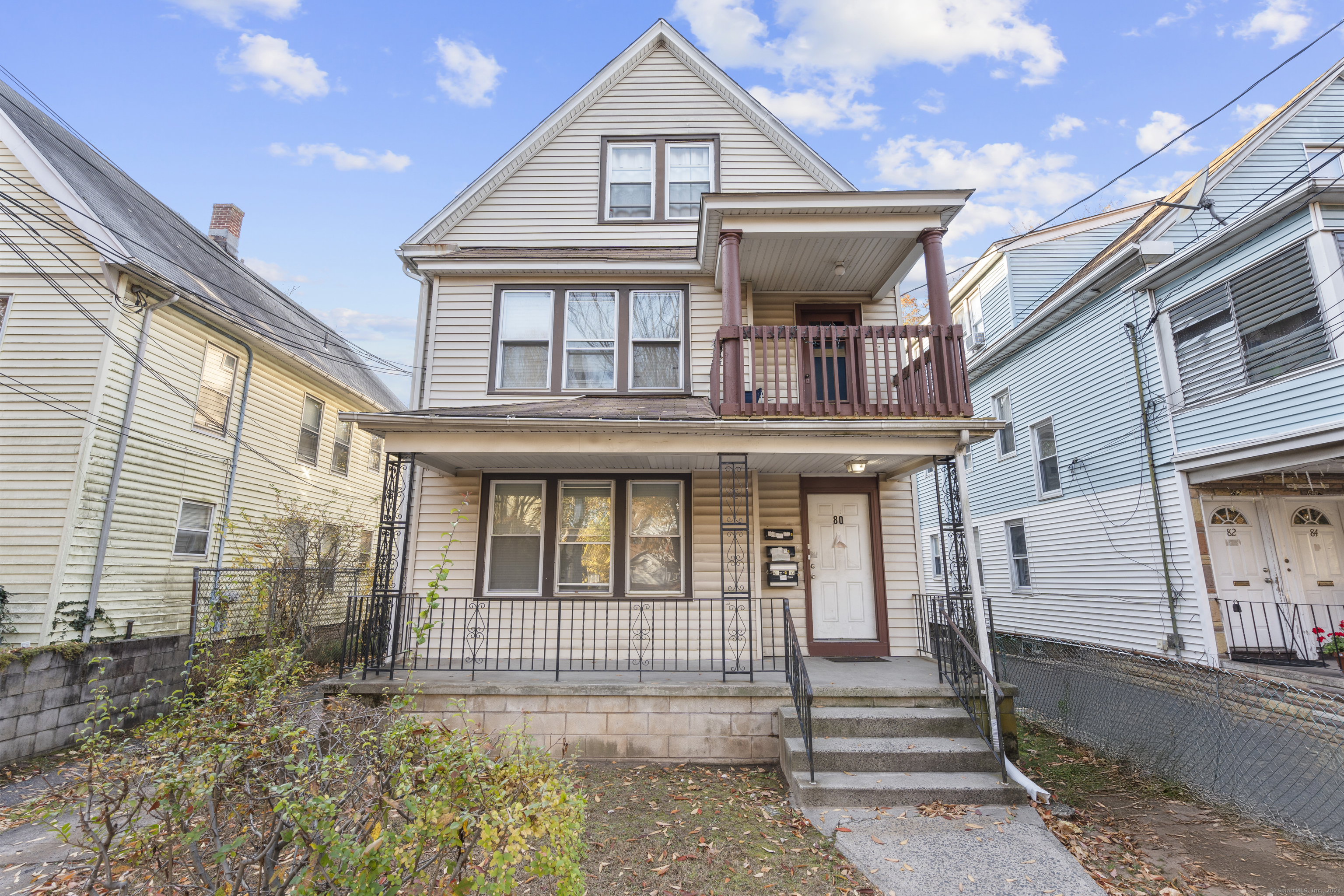 80 Shepard Street New Haven, CT 06511 - Photo 1 of 1 a front view of a house with a garden