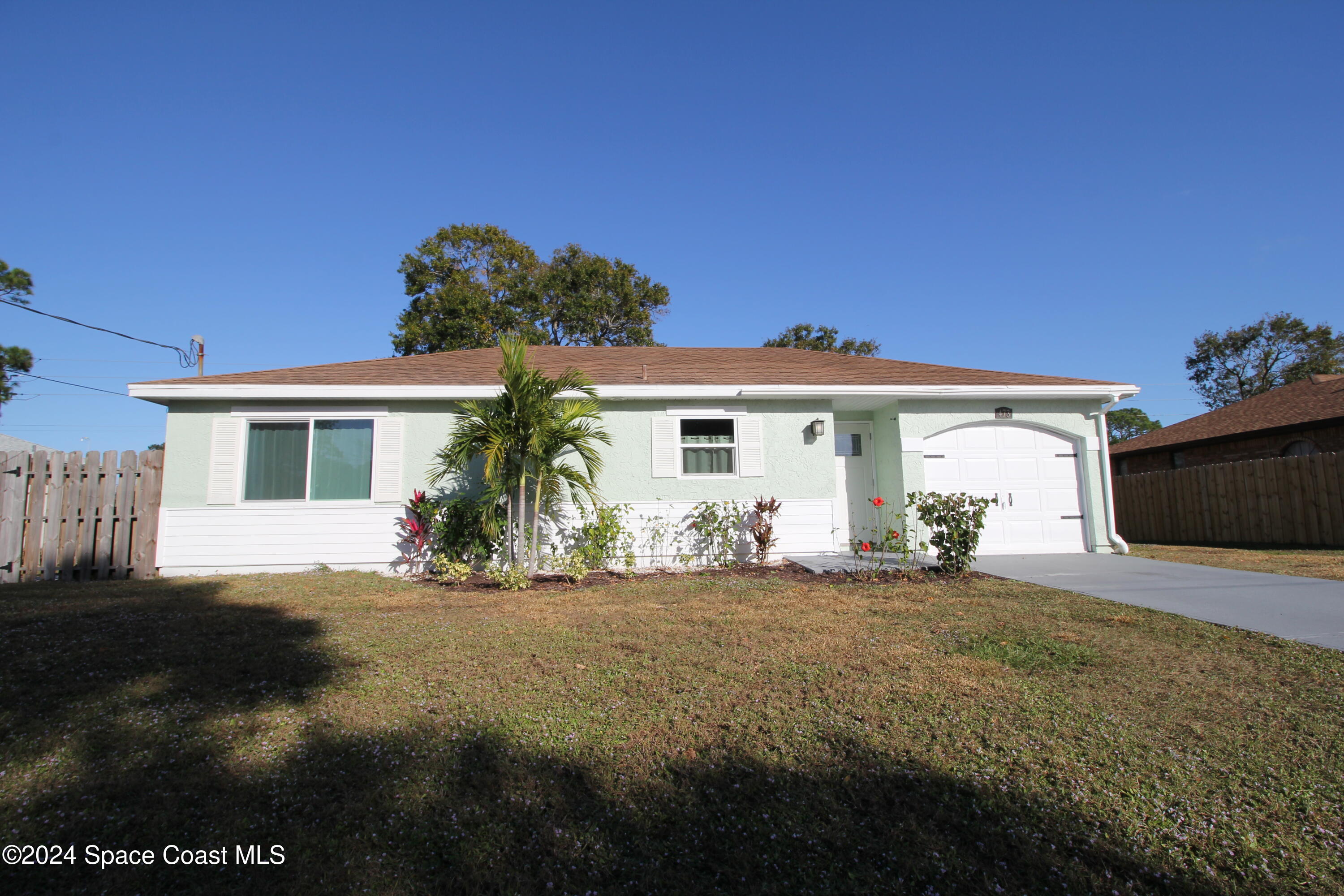 473 Lisa Road Northeast Palm Bay, FL 32907 - Photo 1 of 14 front of house
