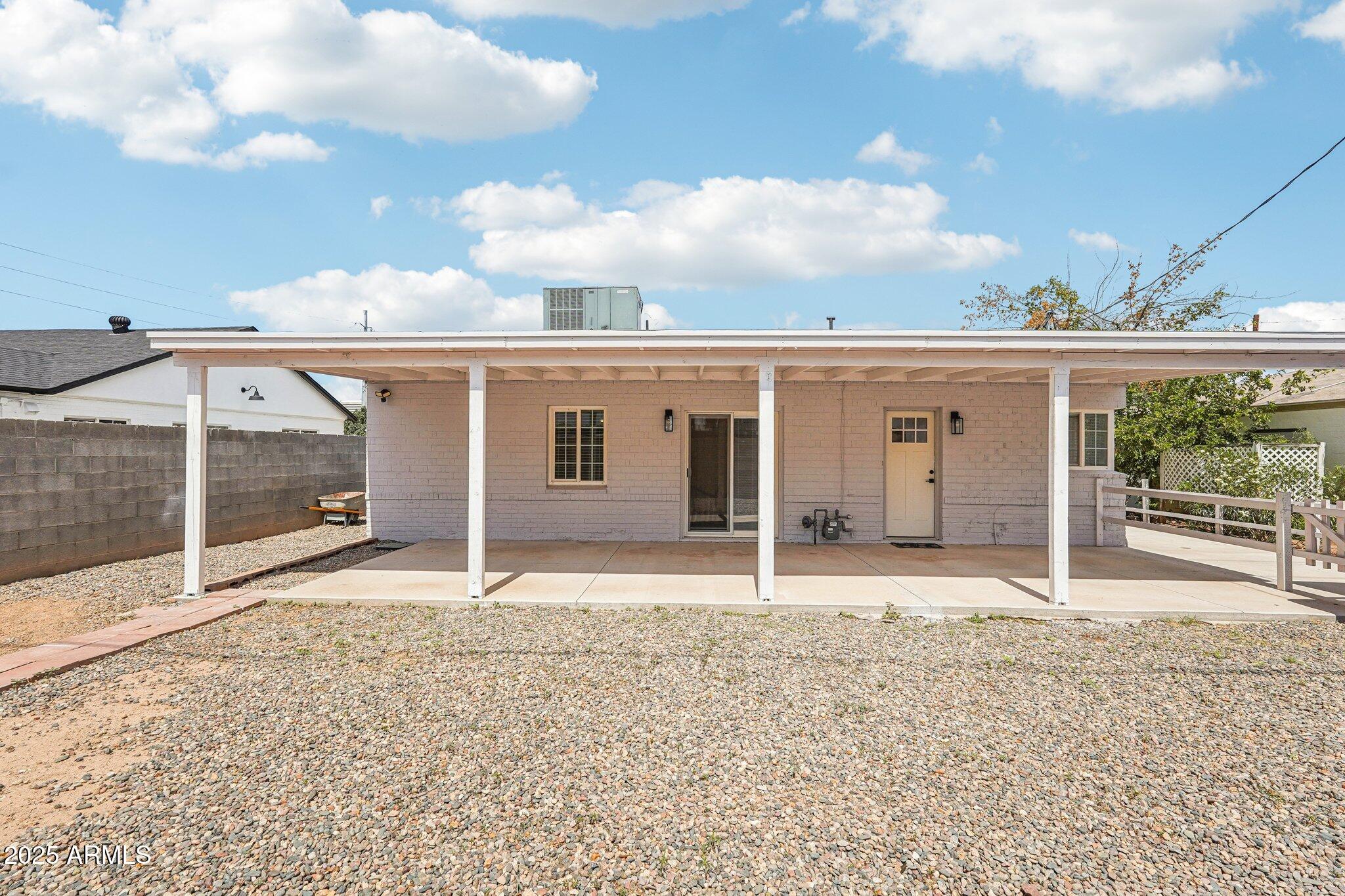 511 East Cheery Lynn Road Phoenix, AZ 85012 - Photo 24 of 33 a view of a house with a backyard
