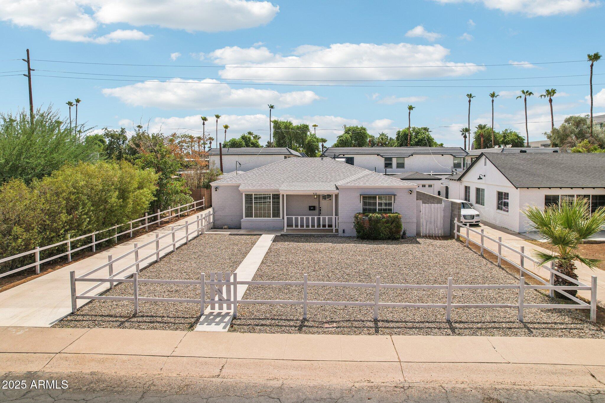 511 East Cheery Lynn Road Phoenix, AZ 85012 - Photo 26 of 33 a aerial view of a house with a garden