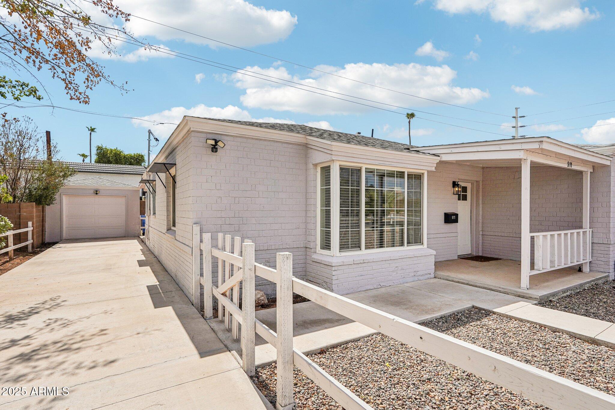 511 East Cheery Lynn Road Phoenix, AZ 85012 - Photo 6 of 33 a view of a house with wooden floor