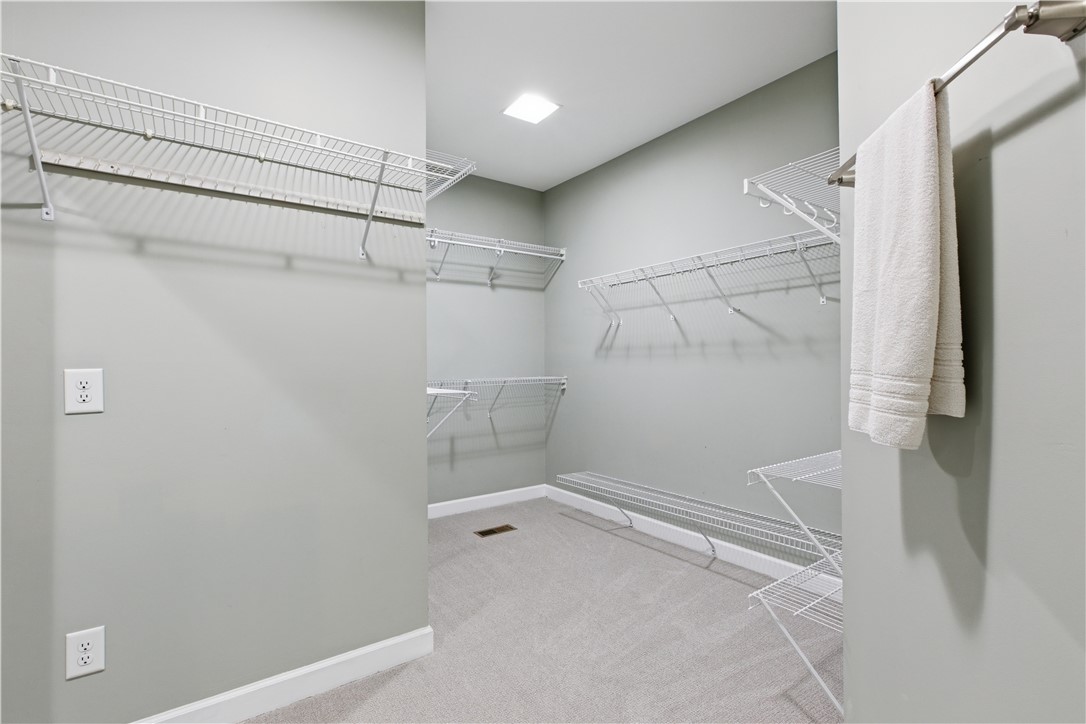 501 Capri Point Lavonia, GA 30553 - Photo 30 of 50 This spacious walk-in closet offers ample storage and organization for your wardrobe.