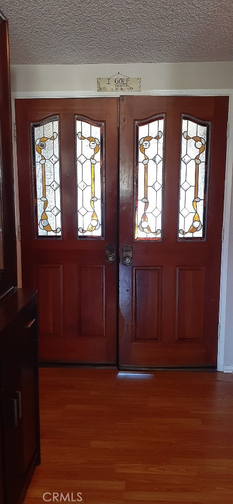 1484 Pepper Tree Drive Hemet, CA 92545 - Photo 7 of 24 Front double wood doors