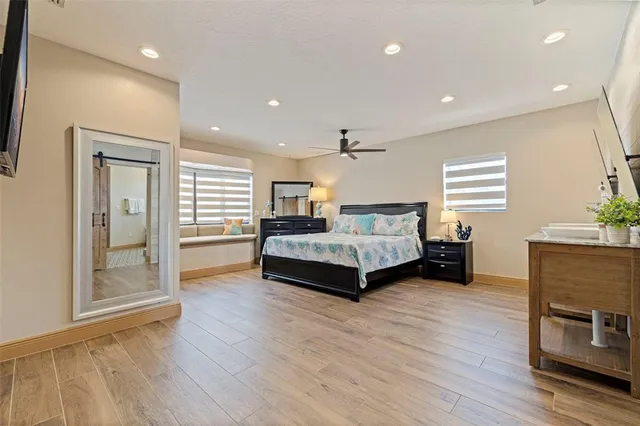 a view of a bathroom with a shower and closet