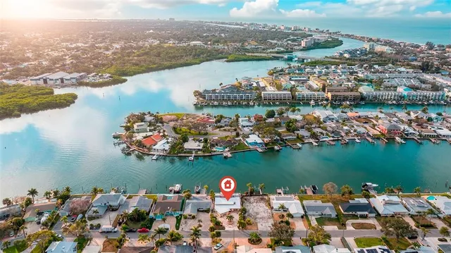 a view of chairs and table in patio