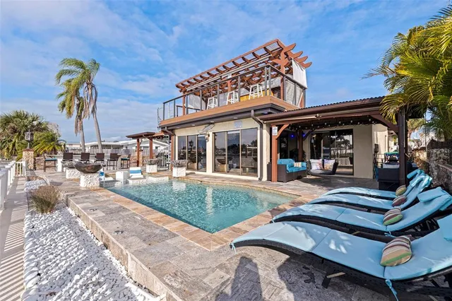 a view of a couches on the roof deck