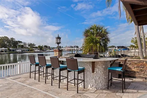 an aerial view of a house with lake view