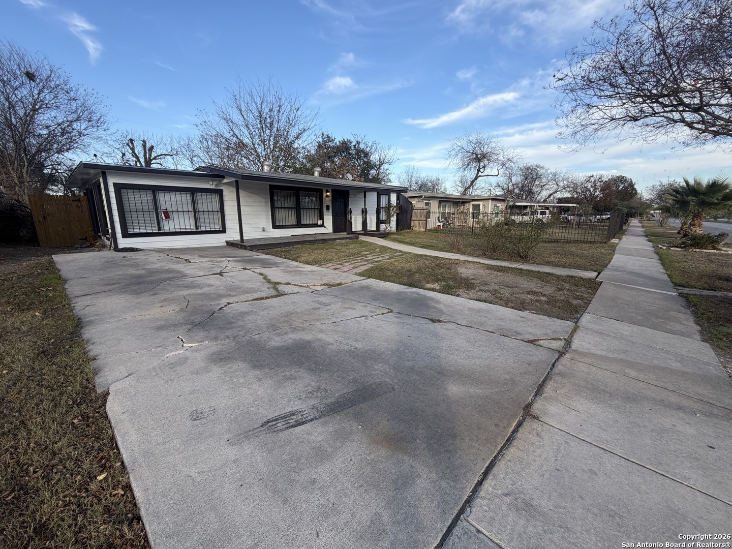 1635 Basse Road San Antonio, TX 78213 - Photo 17 of 17 a front view of a house with a yard