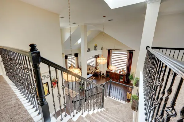 a view of an entryway with hardwood and door
