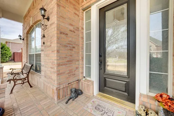 a view of balcony with furniture