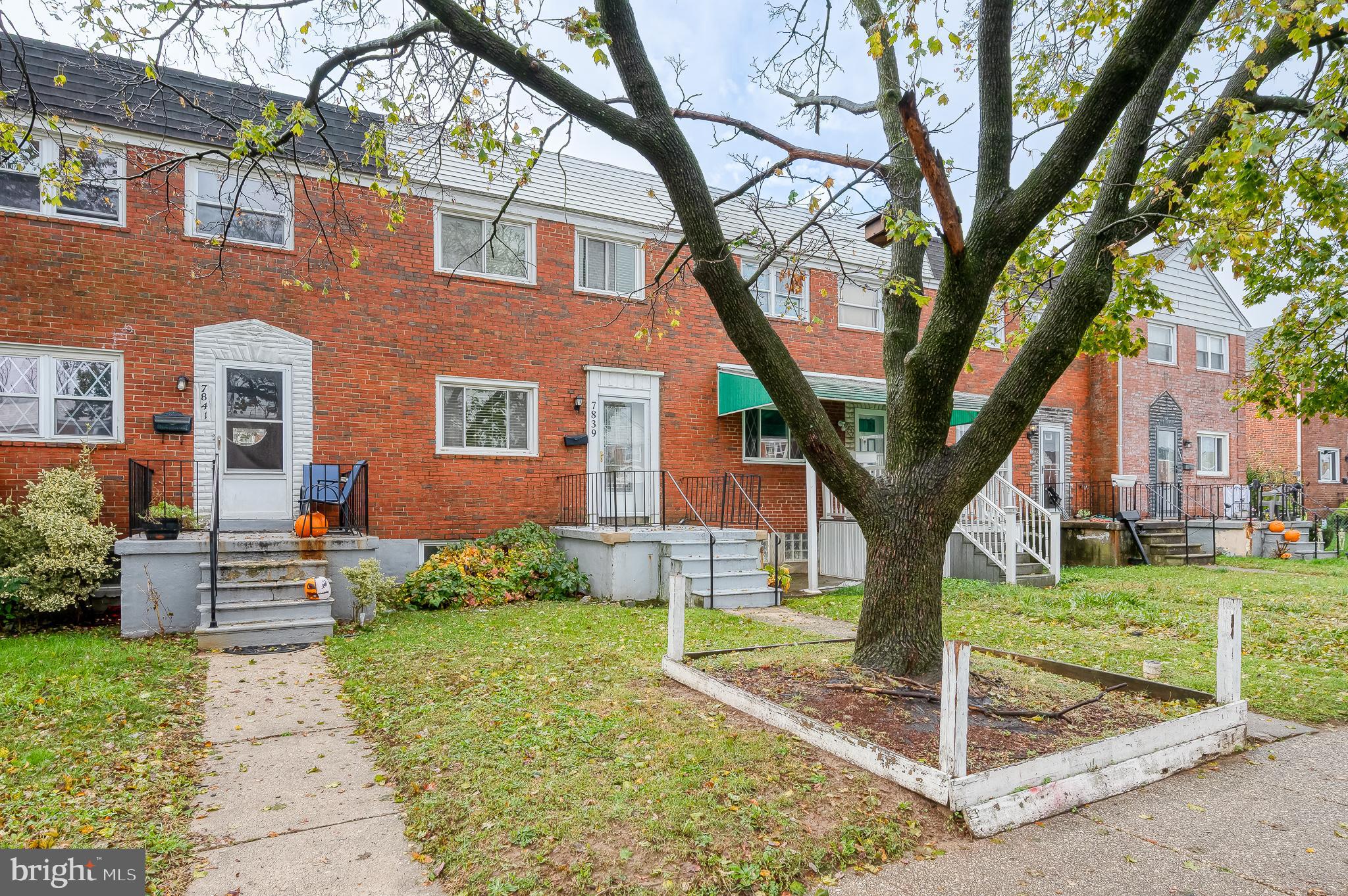 7839 Harold Road Baltimore, MD 21222 - Photo 1 of 49 a front view of a house with garden