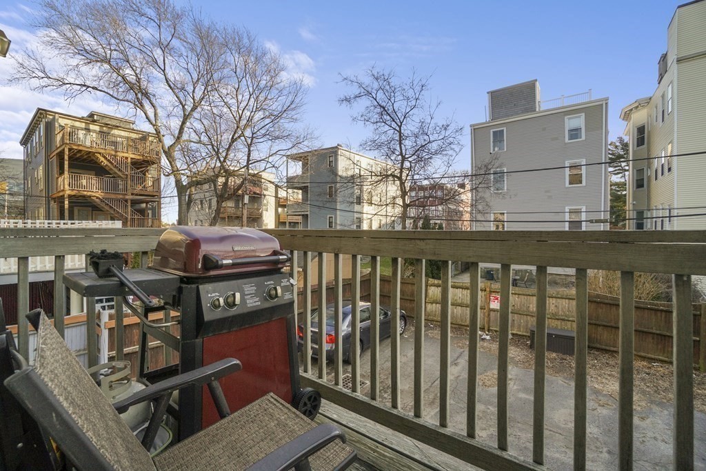 8 Howell Street, Unit 1 Boston, MA 02125 - Photo 12 of 14 a front view of a building with glass windows