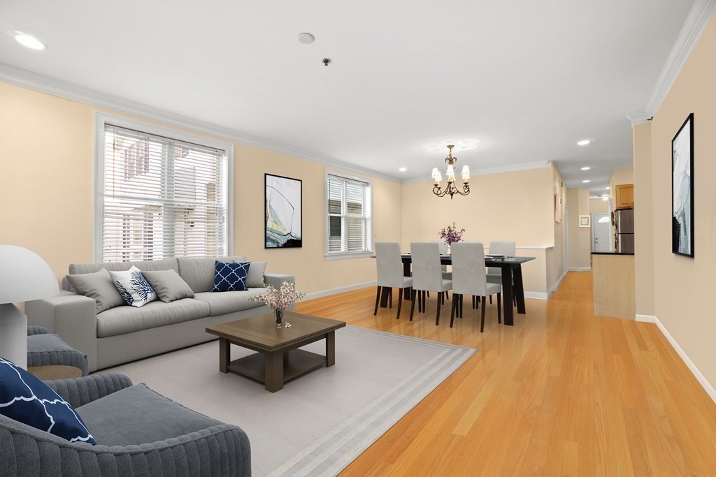 8 Howell Street, Unit 1 Boston, MA 02125 - Photo 4 of 14 a living room with furniture and a large window