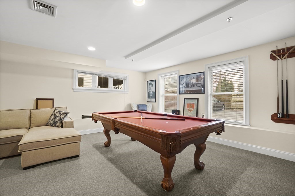 8 Howell Street, Unit 1 Boston, MA 02125 - Photo 9 of 14 a bedroom with furniture and windows