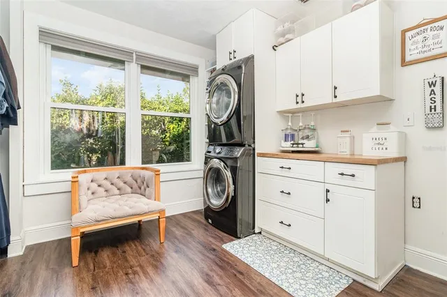 a view of living room with furniture and a window